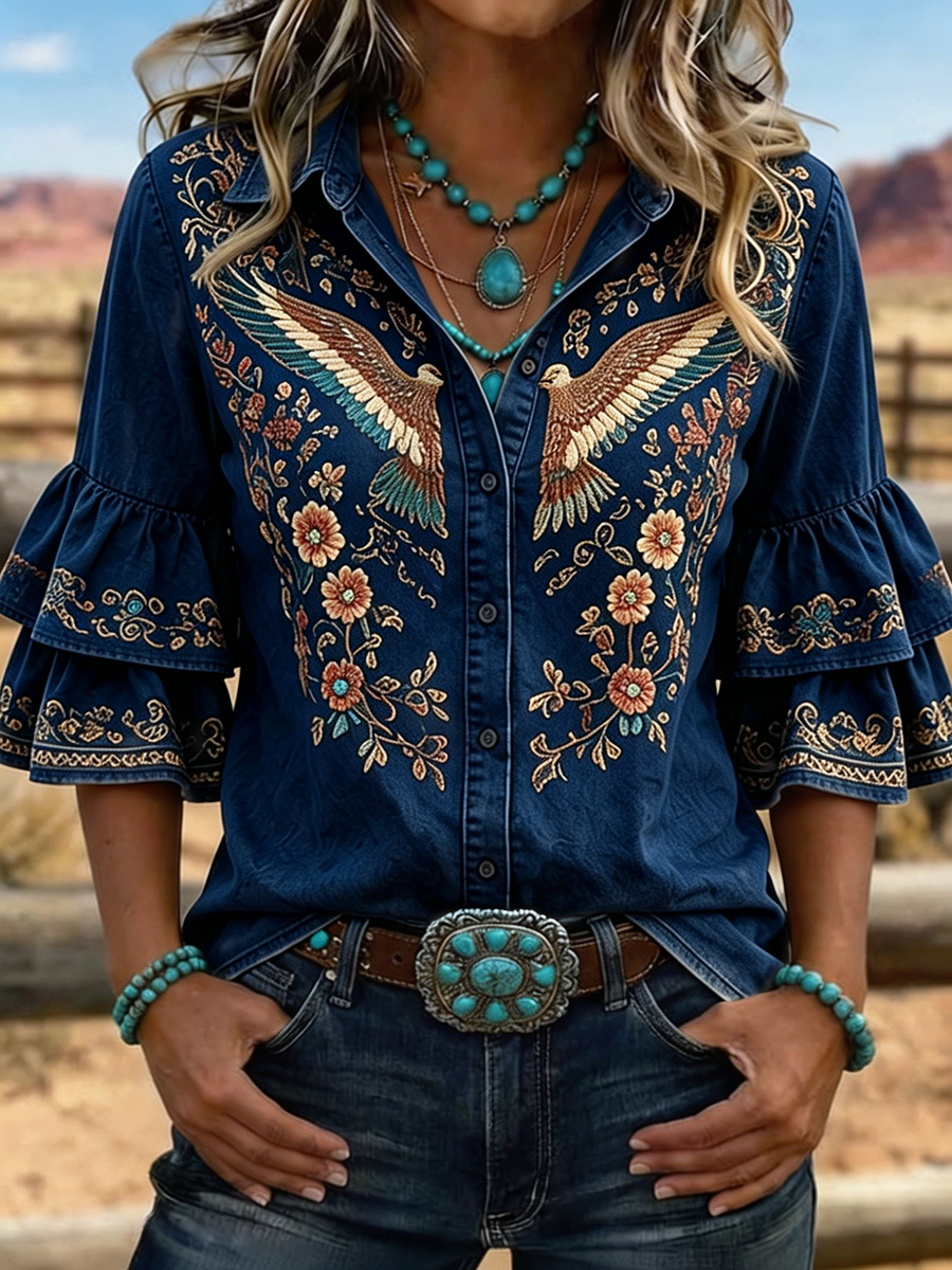 Blusa vaquera de mujer con águila y flores bordadas y mangas con volantes