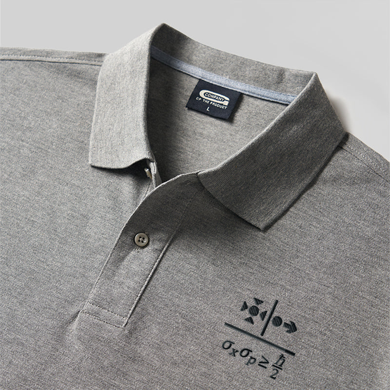 Besticktes Poloshirt mit dem Geek-Design zum Unschärfeprinzip